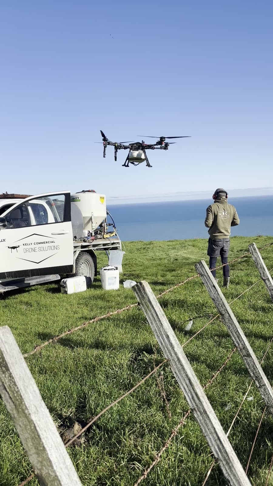 KC Drone Solutions operator flying the XAG drone on a Wairarapa job
