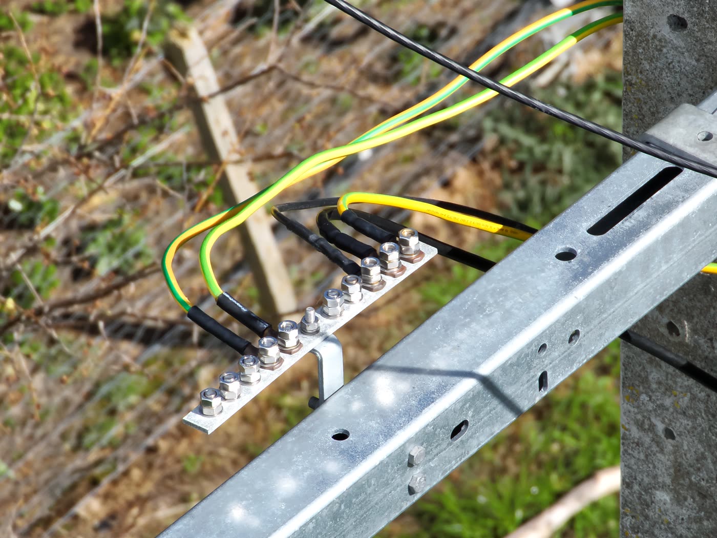 Zoomed drone inspection photo of power pole hardware