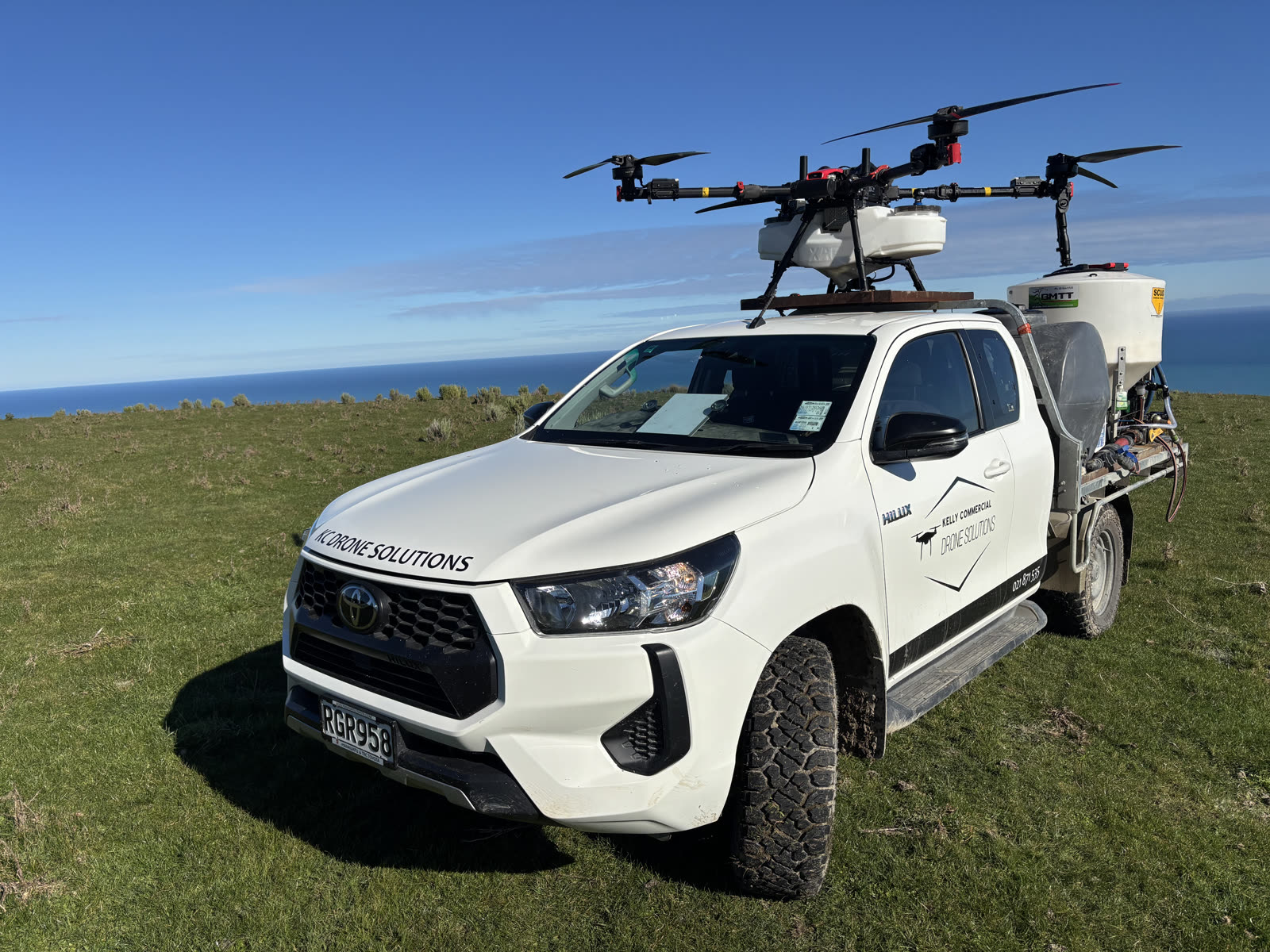 KC Drone Solutions XAG drone mounted on the service vehicle